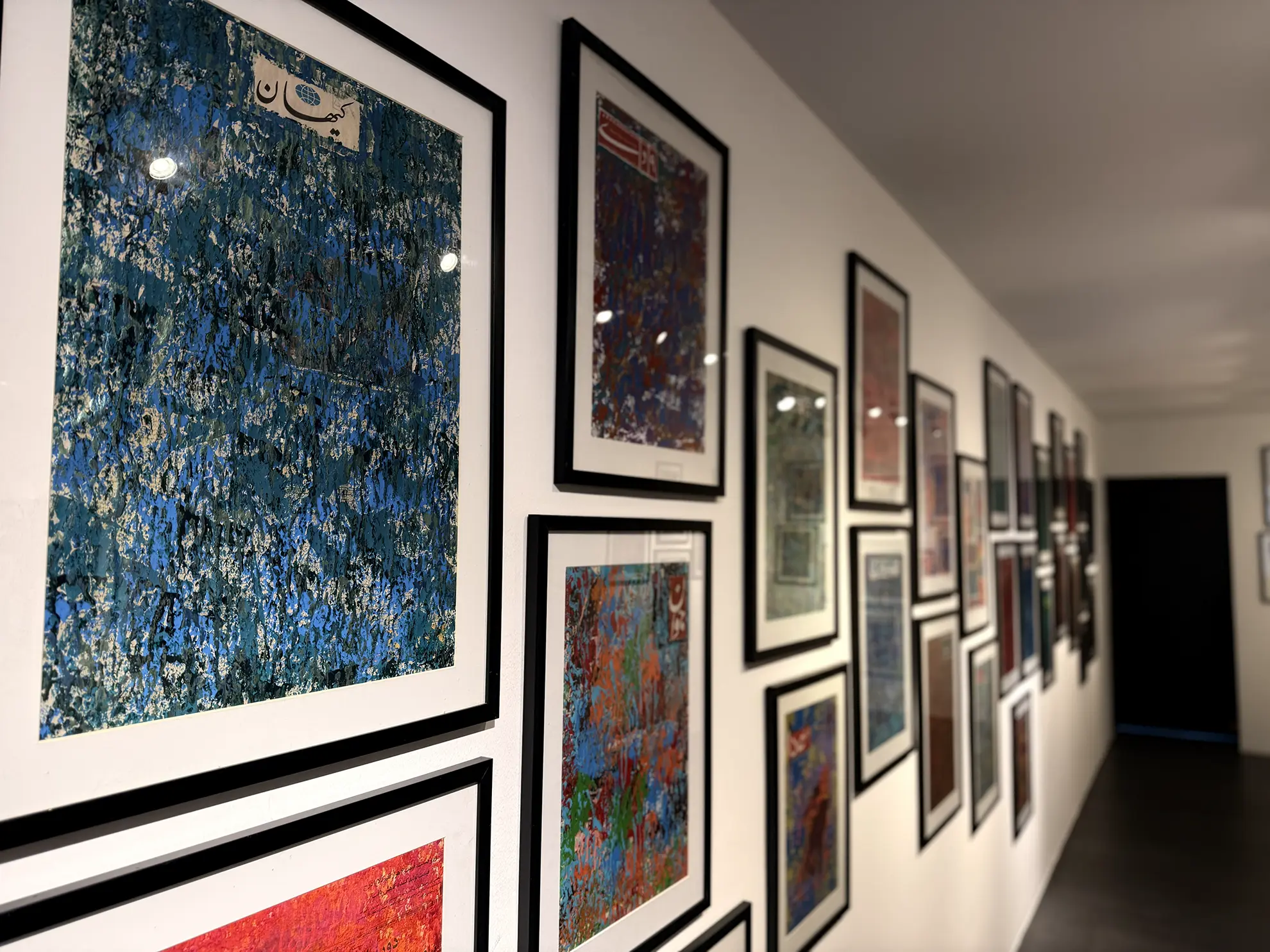 A curated gallery installation of framed works at Matin House